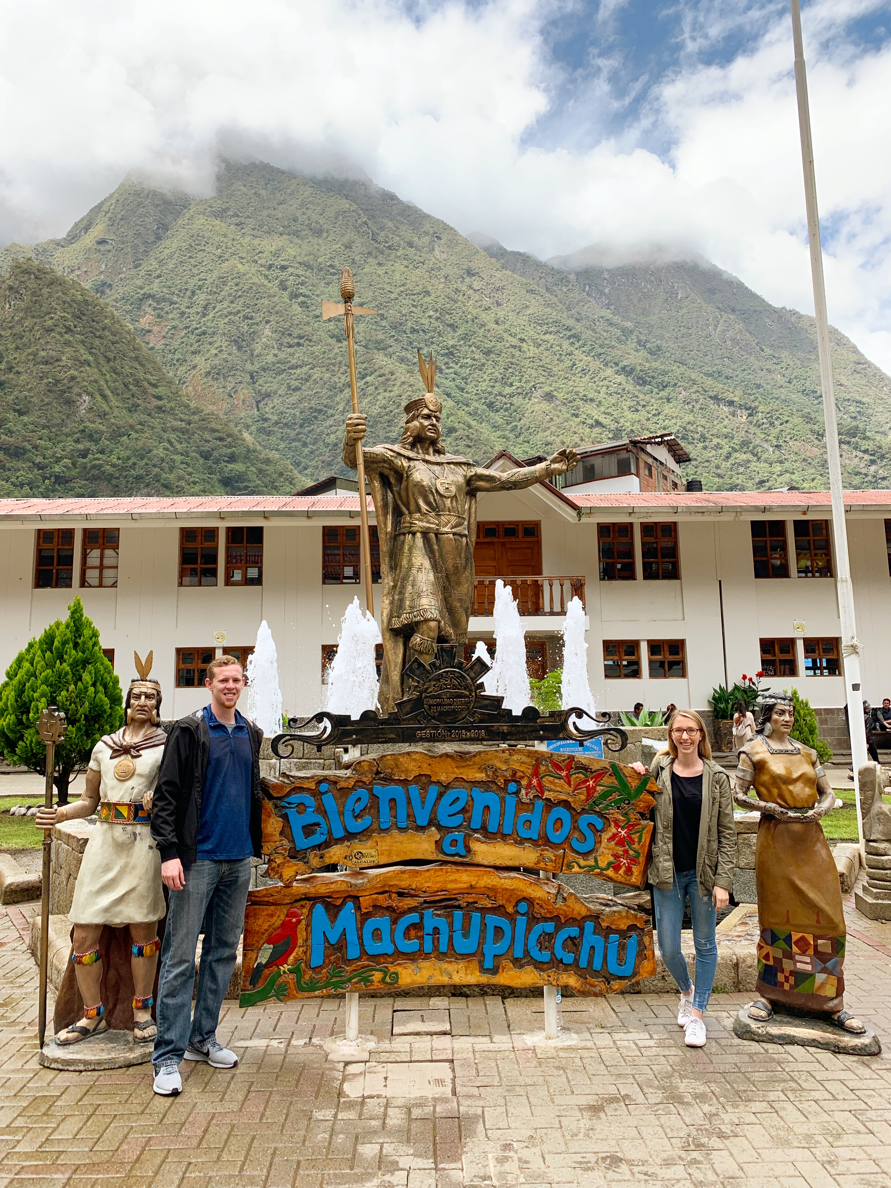 Mark and Amanda next to statue in Aguas Calientes